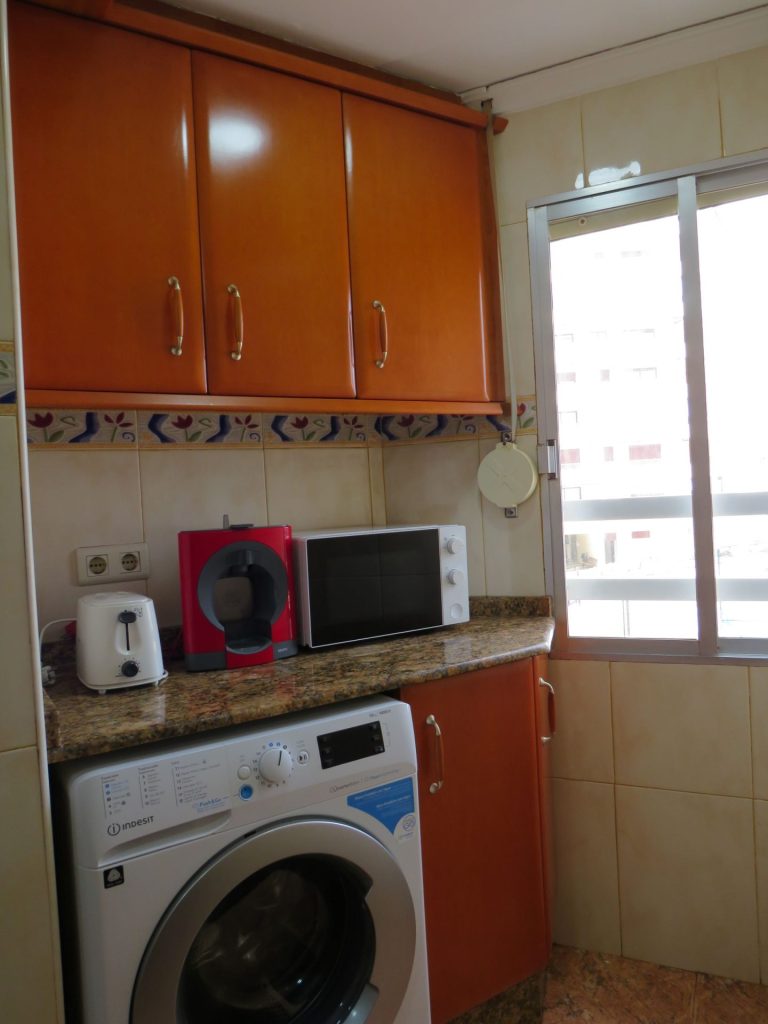 Kitchen with Washing machine